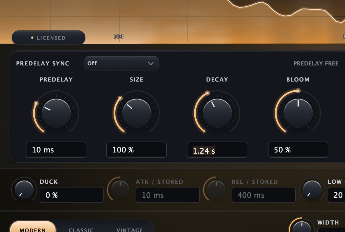 Halo Reverb's core knob row with its unit readouts, PREDELAY 10 ms, SIZE 100 %, BLOOM 50 %, and the DECAY readout open for exact-value entry on a selected 1.24 s